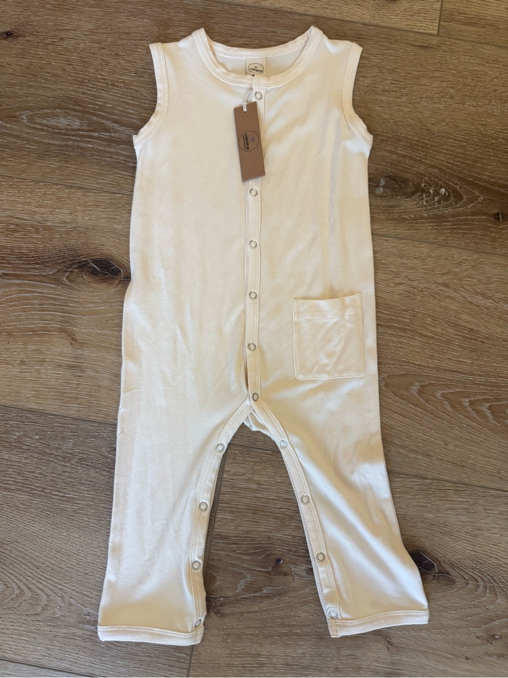 Larkspur Cream Sleeveless bamboo Snap-Front Romper